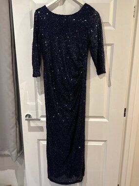 The lady's deep blue evening dress